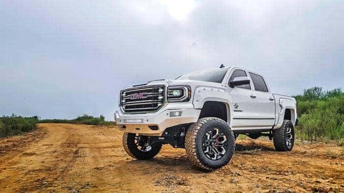 White SCA Performance Lifted Truck