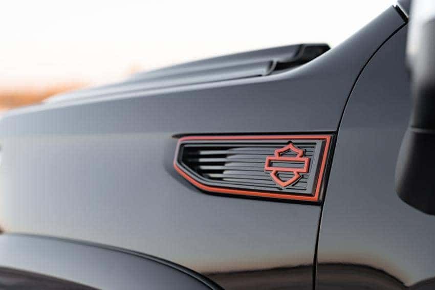 Harley-Davidson GMC Truck Logo on side of front hood of Black truck