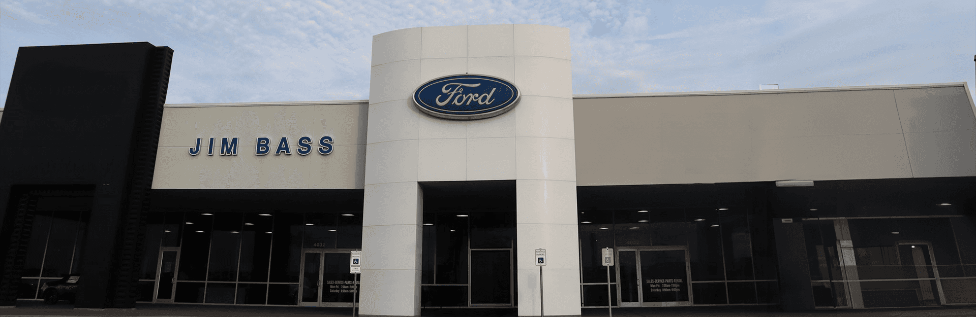 An exterior shot of a Ford vehicle driving on a dirt road.