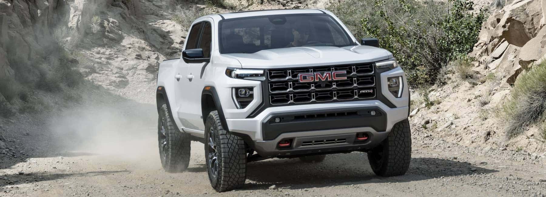 2023-GMC-Canyon-driving-down-gravel-road_mobile