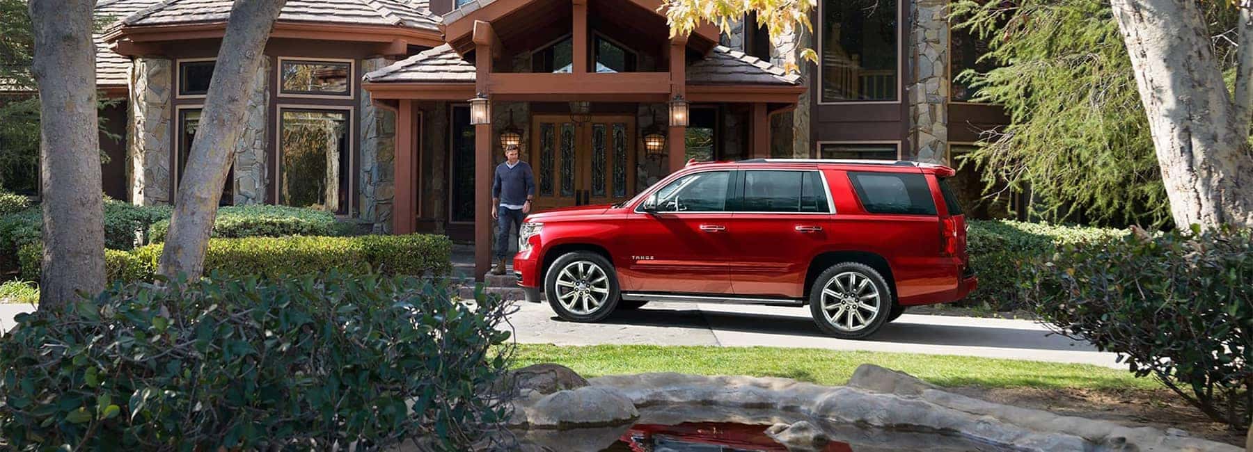 2019 Red Chevrolet Tahoe Parked in front of a House