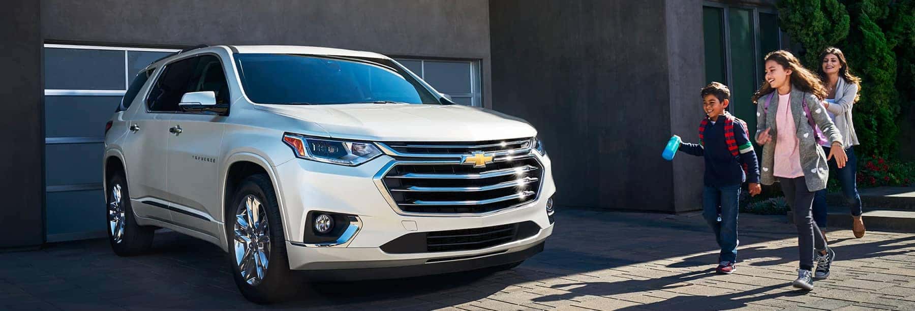 White Chevrolet SUV parked in the driveway