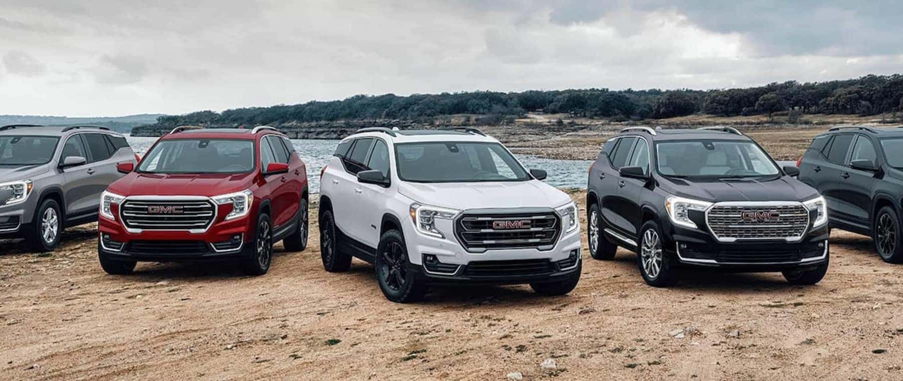 Group of 2023 GMC Terrain SUVs parked on beach