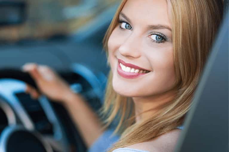 smiling-woman-gives-thumbs-up