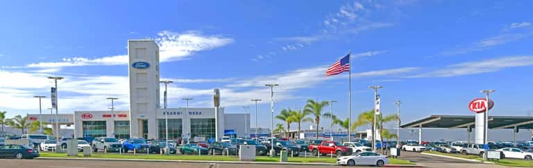 Outside of Kearny Mesa Ford in San Diego during the day. 