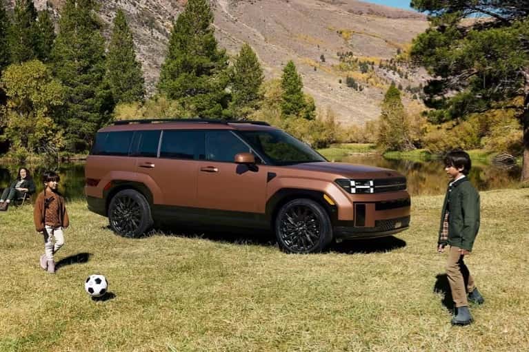 2026-Santa-Fe-family-kicks-soccer-bal