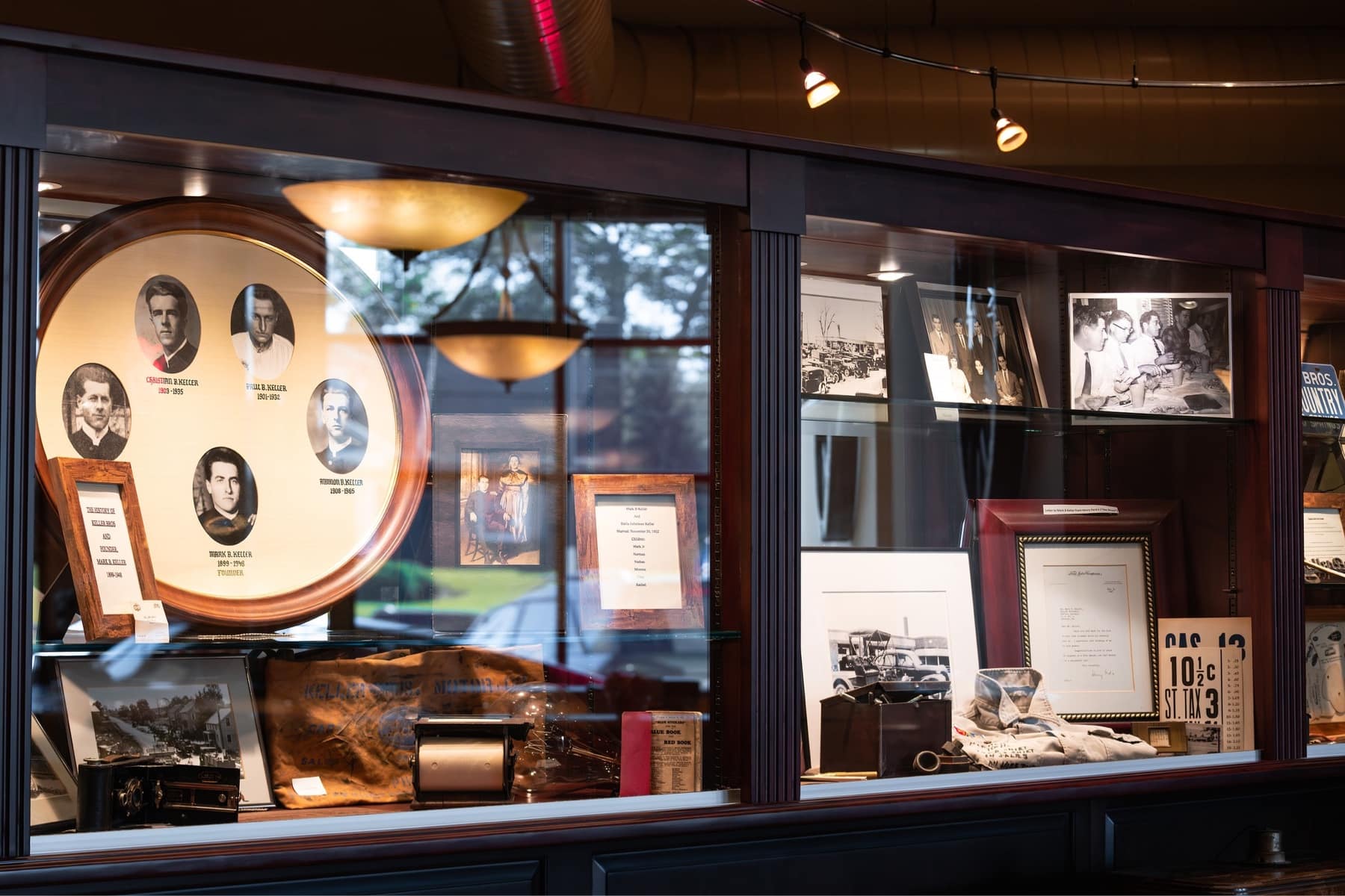 Glass case showing history of Keller Brothers
