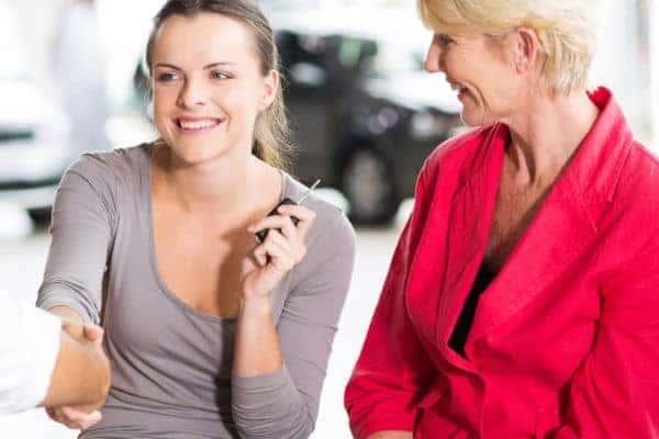 Two women in a dealership