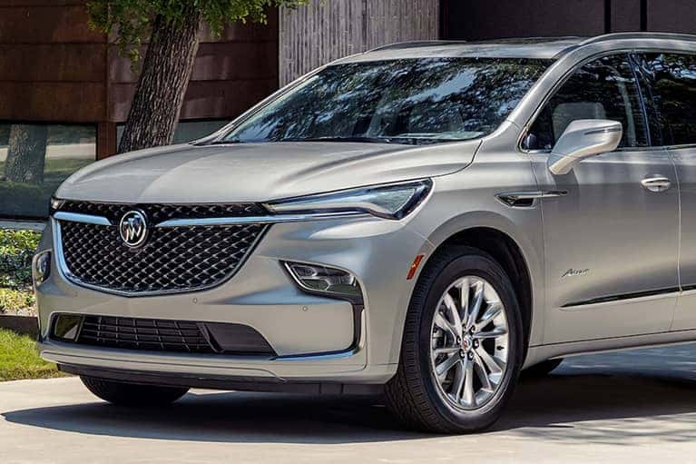 2023-Enclave-Avenir-parked-in-driveway