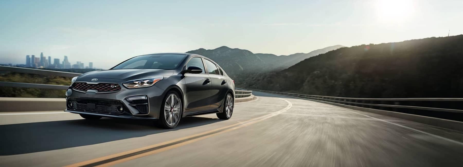 2020 Kia Forte driving on a road