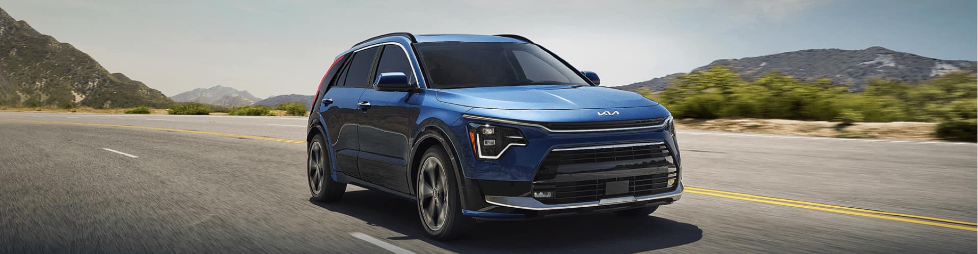 2023 Niro plug-in hybrid drives mountains in distance