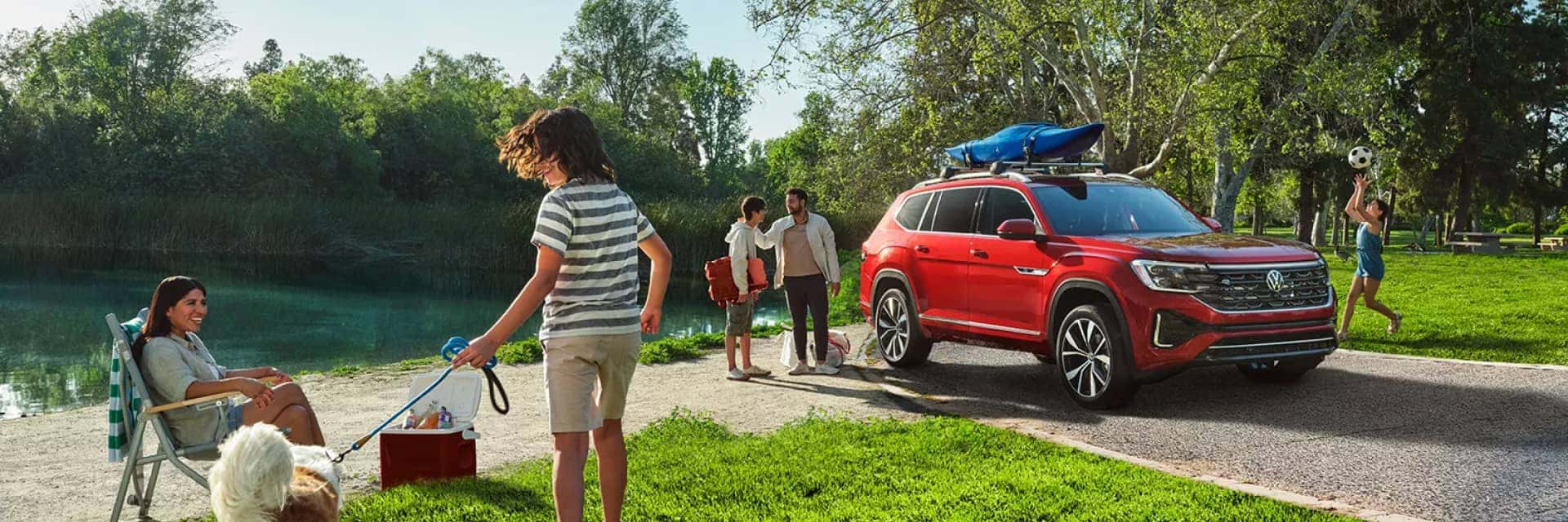 Red VW with a family