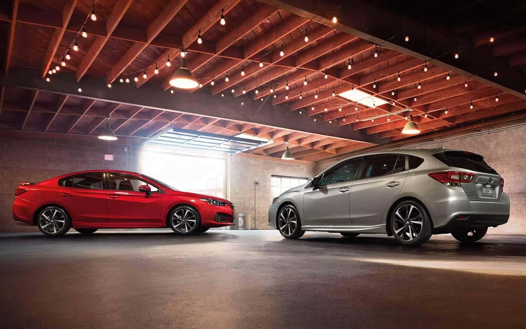 Subaru vehicles in a garage