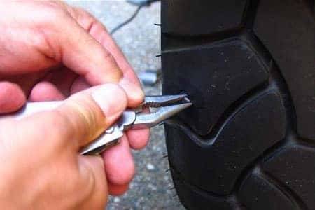 If you have a nail in your tire, should you take it out or leave it in? -  Quora