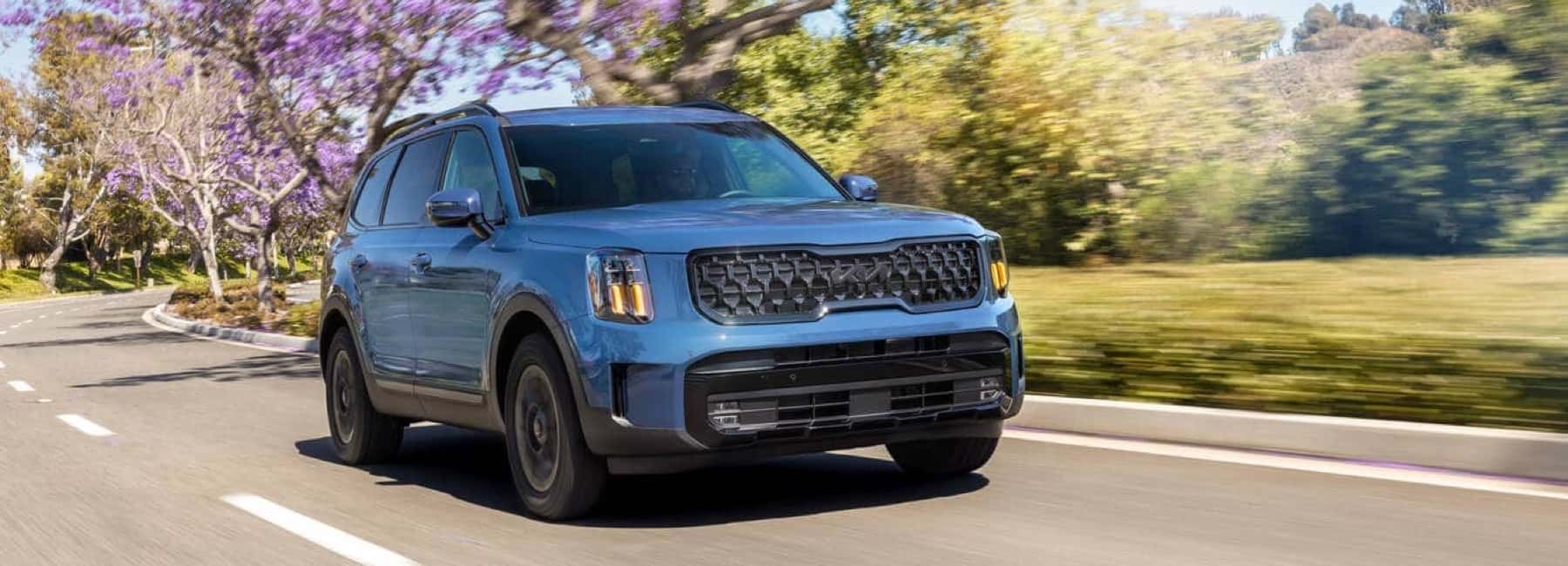2026-Kia-Telluride-drives-country-road