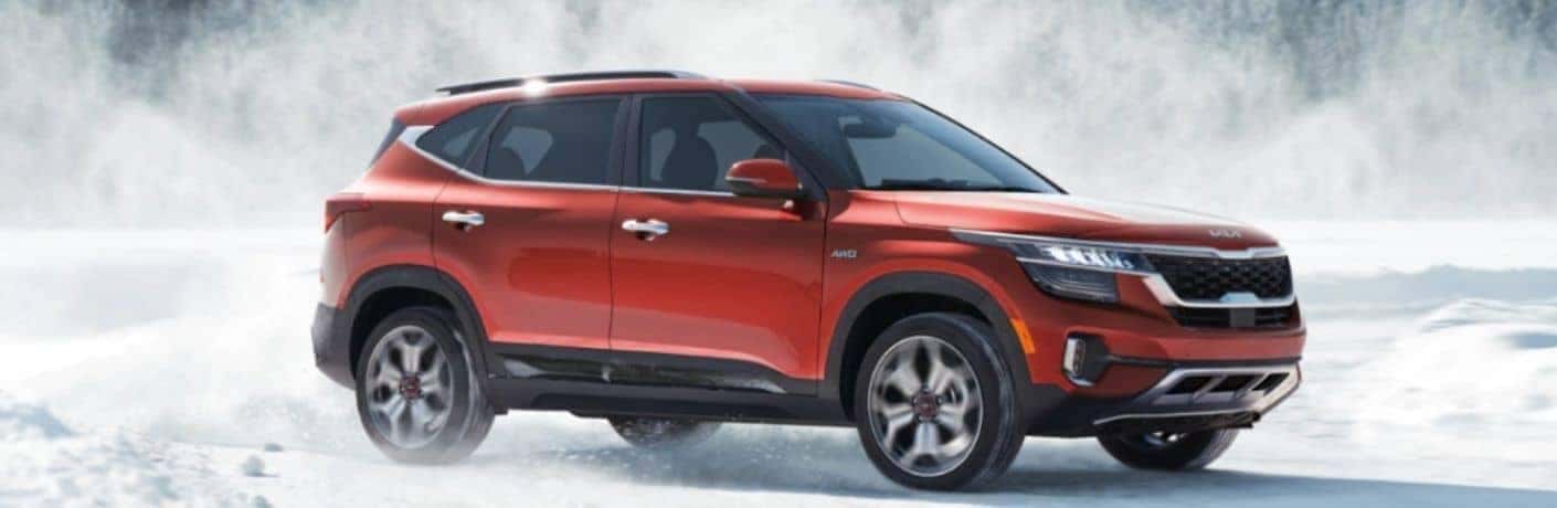 2022 Kia Seltos driving through snow