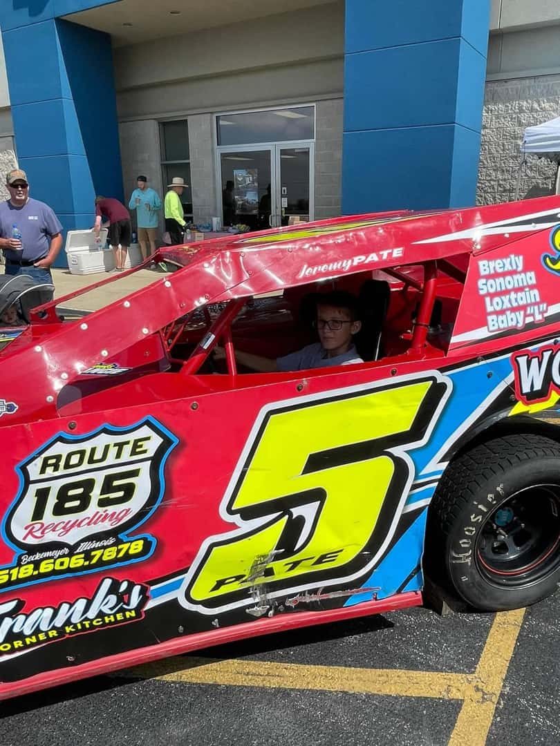 person-in-nascar-car-behind-wheel