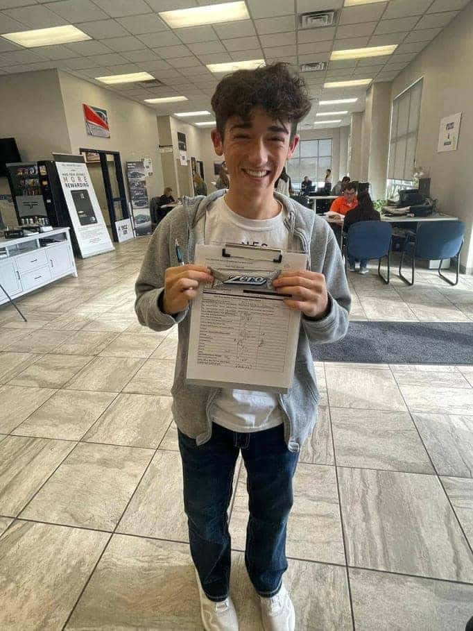 young-person-holding-a-form