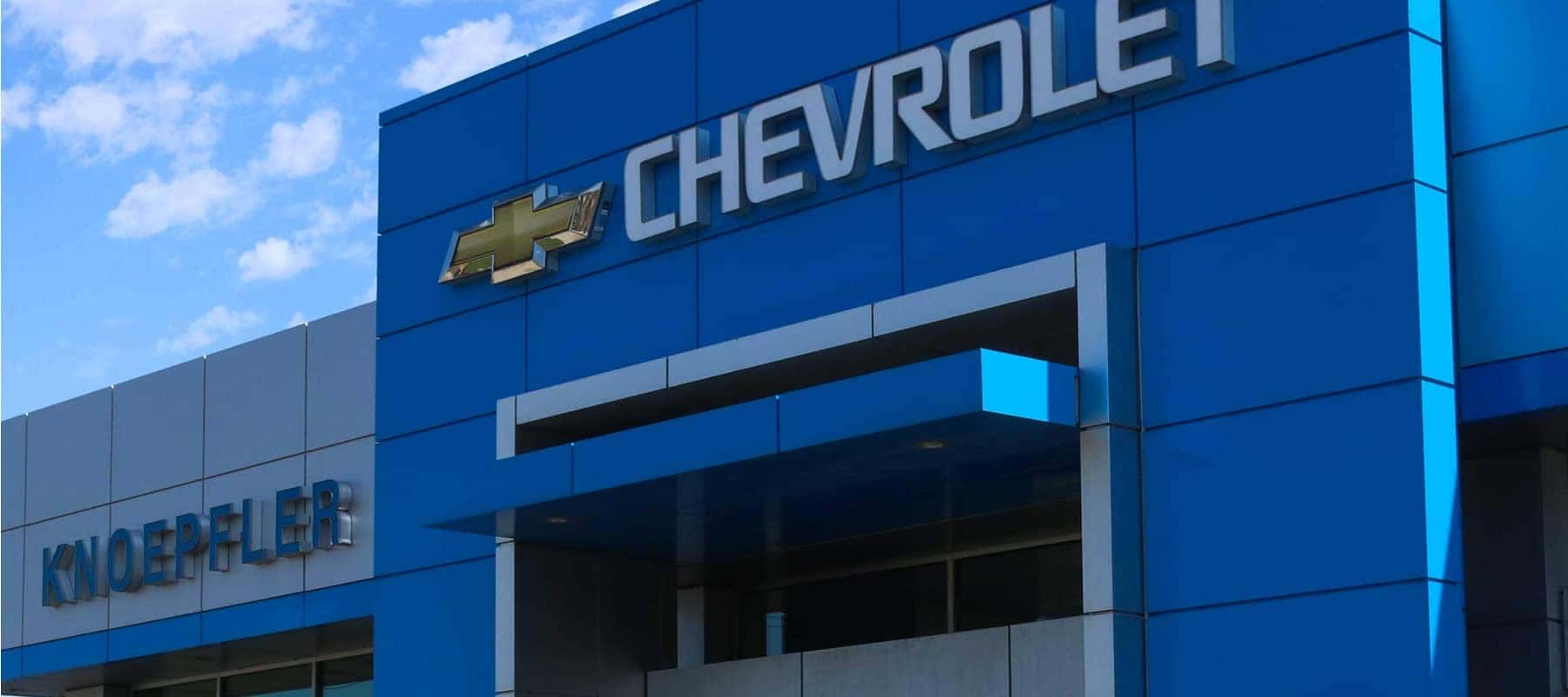 An exterior shot of a Chevrolet dealership.