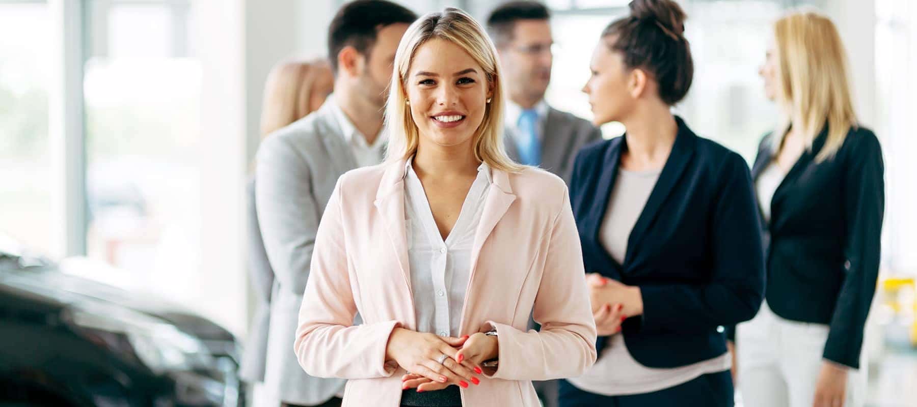 Business Woman Standing in front of People