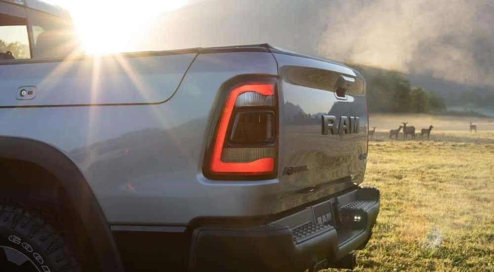 A close up shows the driver side taillight on a grey 2024 Ram 1500 Rebel.