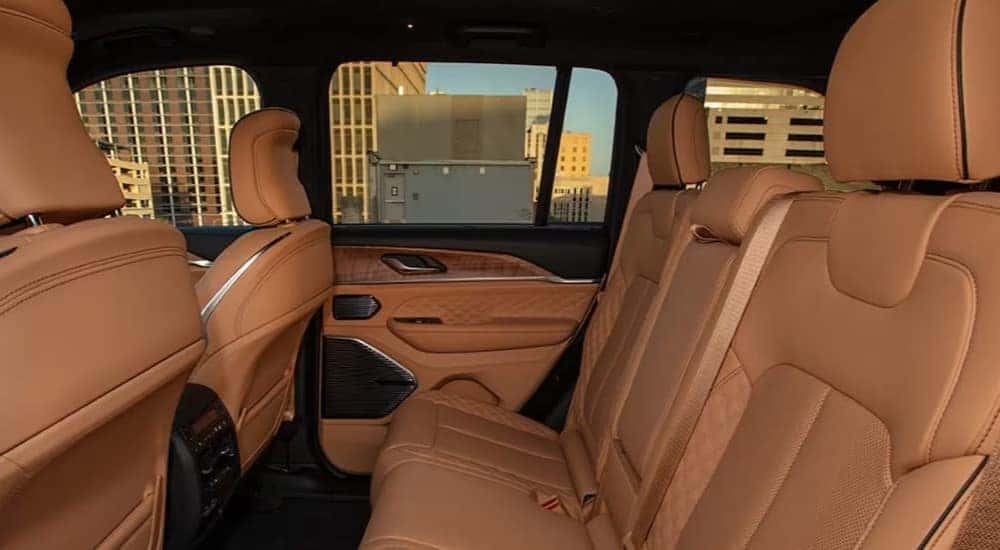 The brown leather interior is shown in a 2024 Jeep Grand Cherokee.