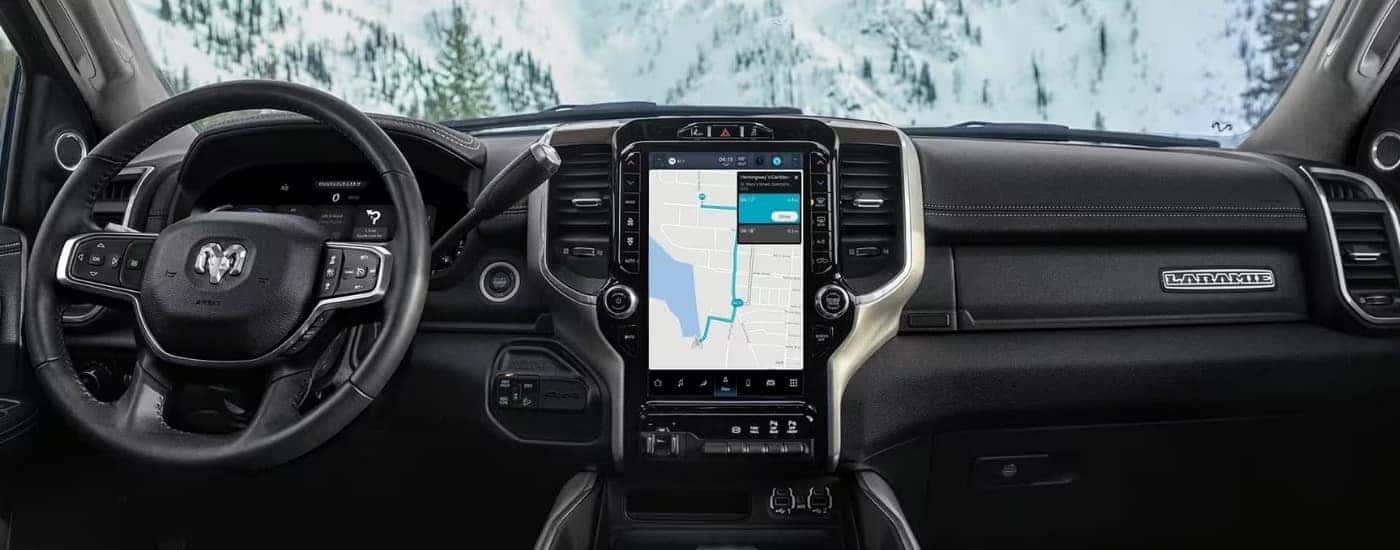 The black interior of a 2024 Ram 2500 Laramie is shown from above the center console.
