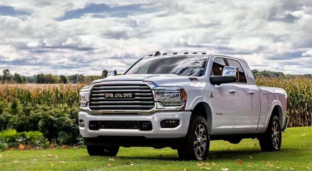 A white 2024 Ram 2500 is shown on a cloudy day after looking at Ram trucks for sale near Charlotte.