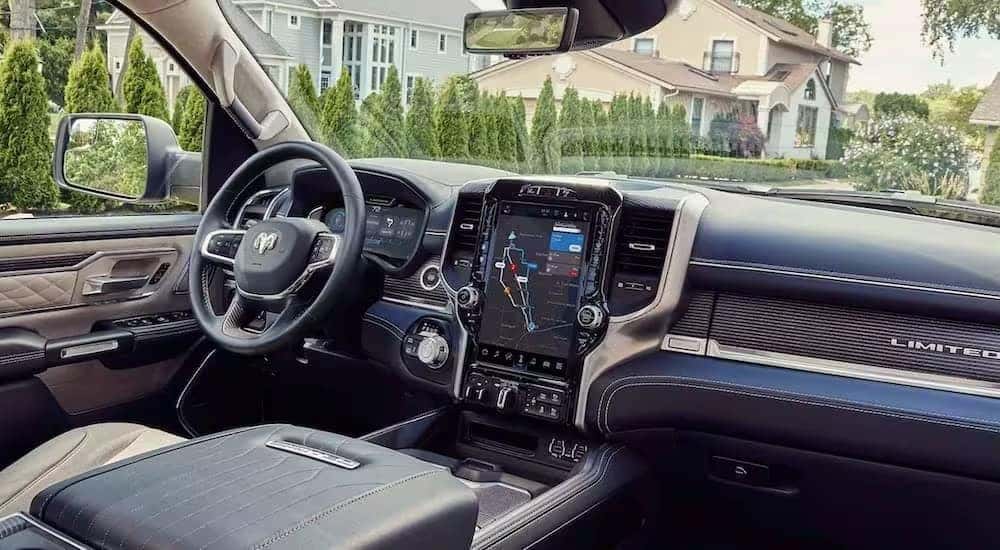 The black and gray interior and dash is shown in a 2024 Ram 1500 Limited.