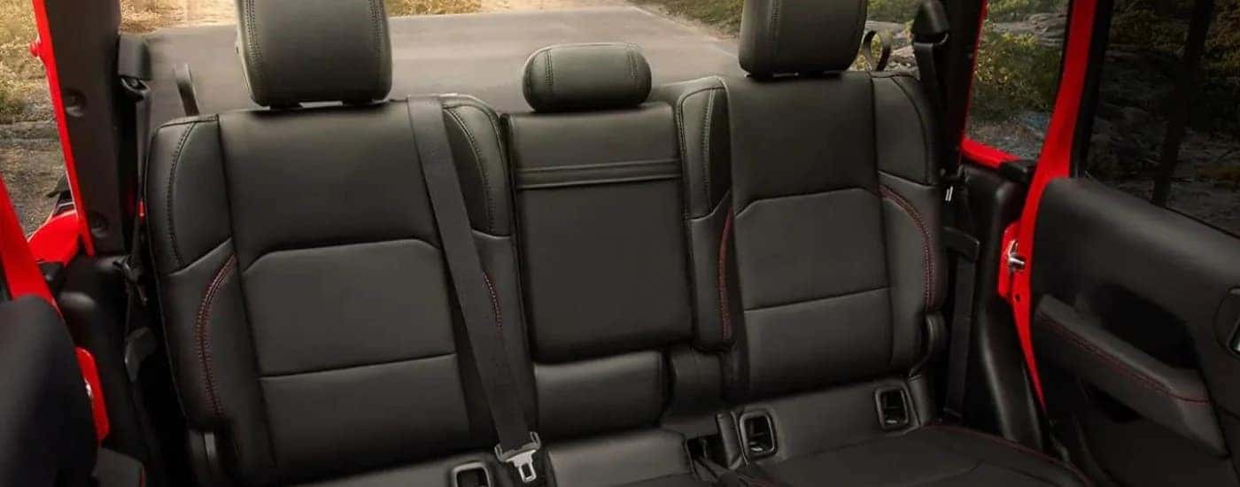 Black leather seats in the interior of a 2024 Jeep Gladiator.