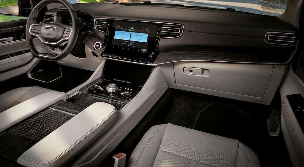 The black and white interior and dash is shown in a 2024 Jeep Wagoneer.