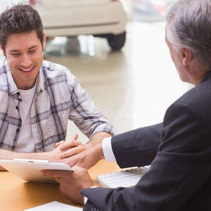 Land Rover customer signing paperwork