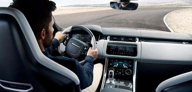 Man driving a Land Rover