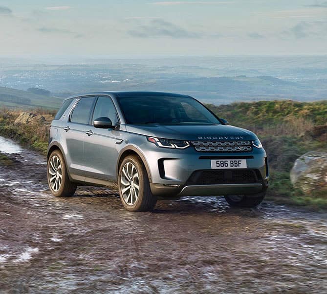Land Rover Discovery Sport near a lake