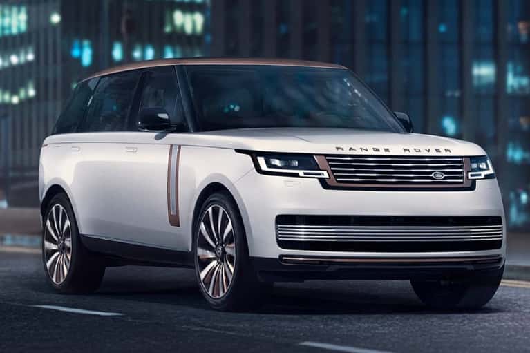 2025-land-rover-range-rover-driving-city-highway-mobile