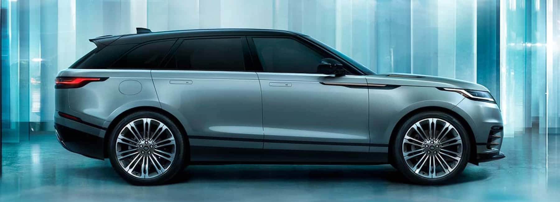 2026-land-rover-range-rover-velar-parked-silver-profile-mobile