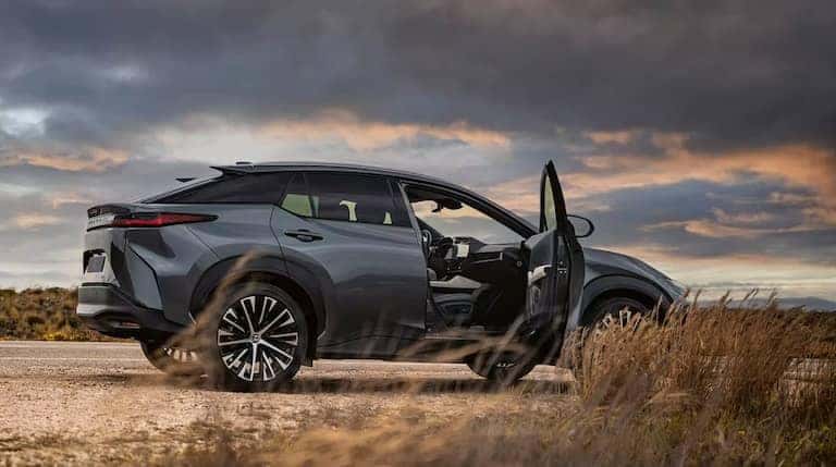 2024-Lexus-RZ-450E-Sideview-with-passenger-door-open