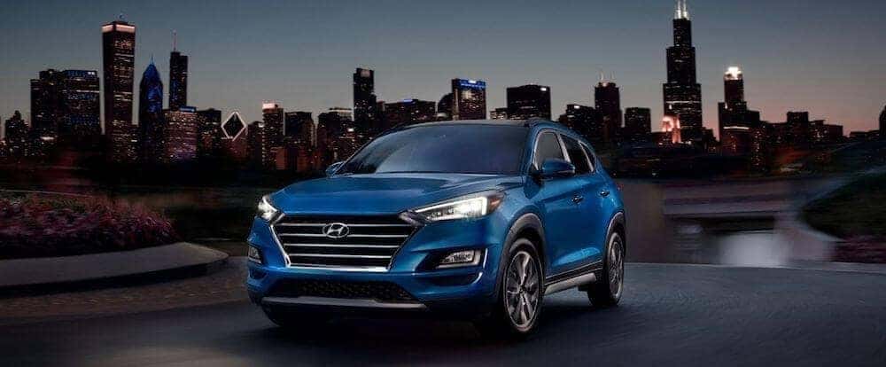 2020 Hyundai Tucson in front of city skyline