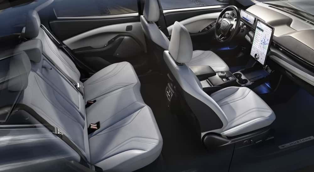 Gray leather seating is shown in a 2023 Ford Mustang Mach-E.