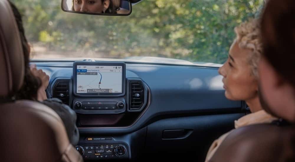 Navigation is shown on the infotainment screen in a 2024 Ford Bronco Sport.