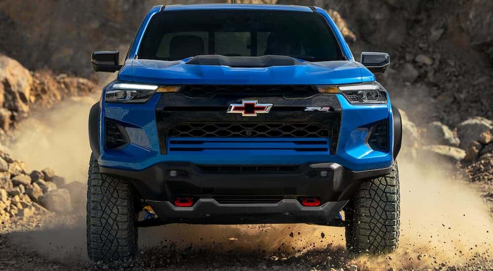 A close up of the front of a blue 2024 Chevy Colorado ZR2.