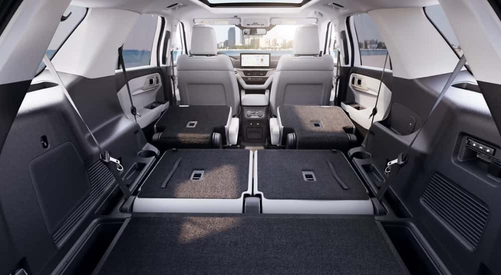 The black and white interior is shown in a 2025 Ford Explorer.