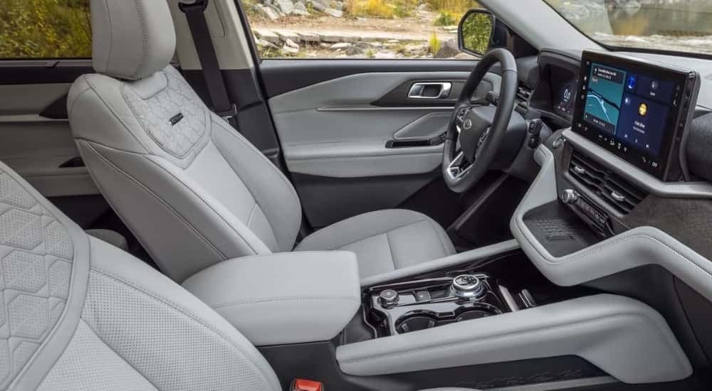 Grey leather seating is shown in a 2025 Ford Explorer Platinum.