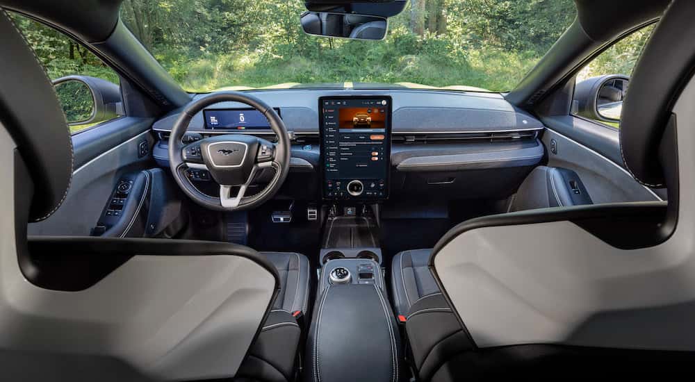 The interior of a 2025 Ford Mustang Mach-E for sale is shown.