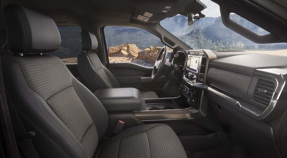 The interior of a 2023 Ford F-150 Rattler is shown.