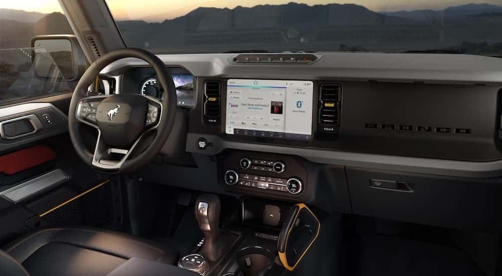 The black interior and dash are shown in a 2024 Ford Bronco Sport.