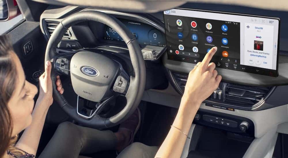 The gray interior and dash are shown in a 2024 Ford Escape.
