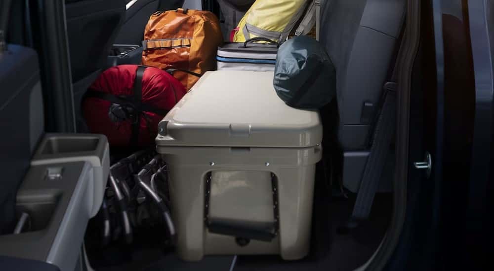 Rear seat storage is shown in a 2024 Ford F-150 Tremor.
