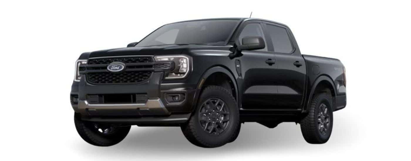 A black 2024 Ford Ranger is shown angled left.