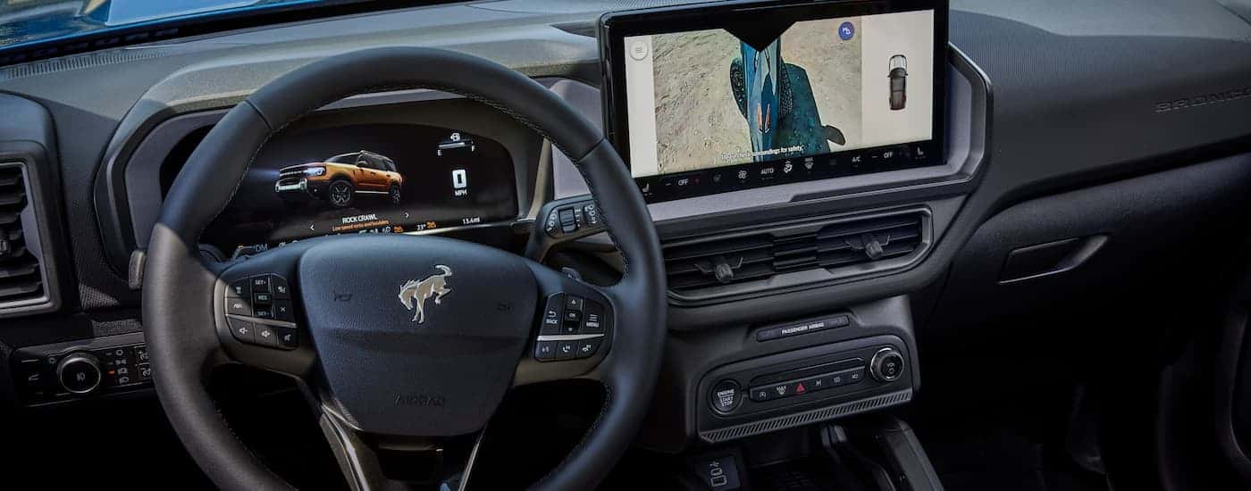 A close up of the dashboard and infotainment center in a 2025 Ford Bronco Sport Badlands.